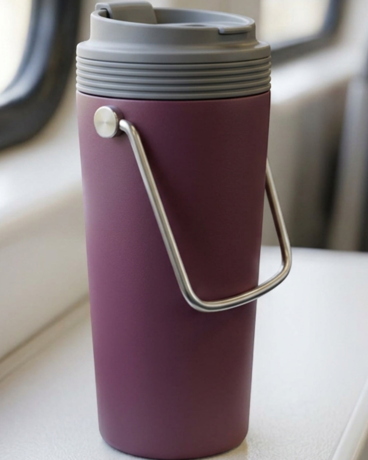 Zptwn Folding-Handle Vacuum Travel Cup 18 oz Plum Stone - Lifestyle view