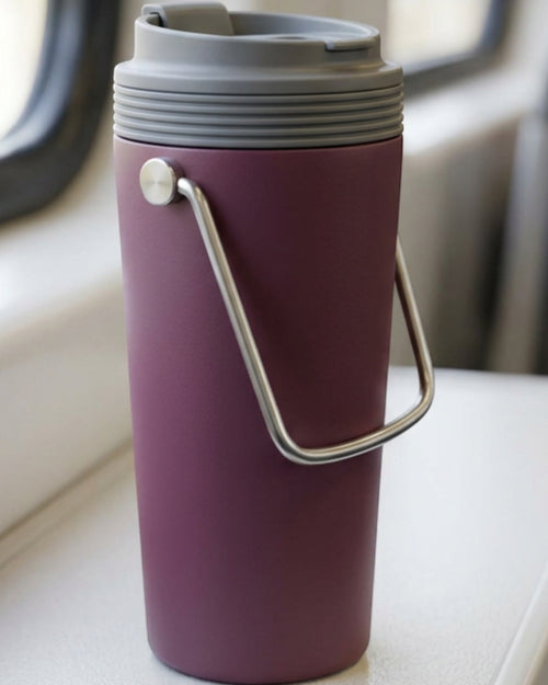 Zptwn Folding-Handle Vacuum Travel Cup 18 oz Plum Stone - Lifestyle view